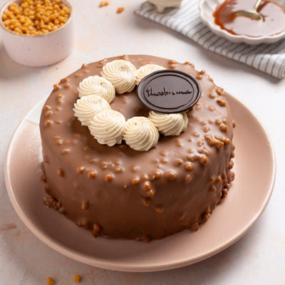 Eggless Butterscotch & Milk Chocolate Cake Eggless Butterscotch & Milk Chocolate Cake
